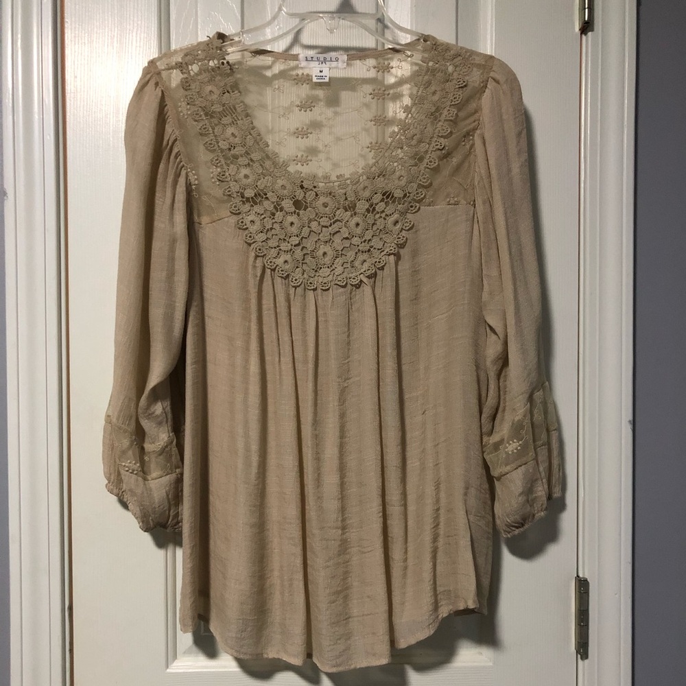 Tan colored sheer top. Size M.